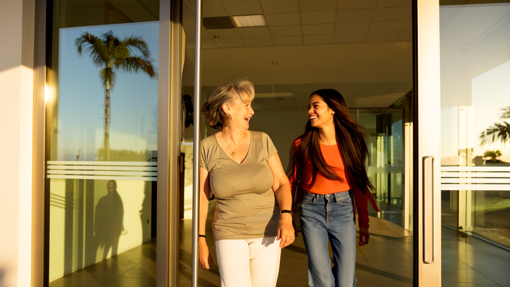 Mother and daughter smiling after affordable dental cleanings at a Lake Worth dental office near West Palm Beach
